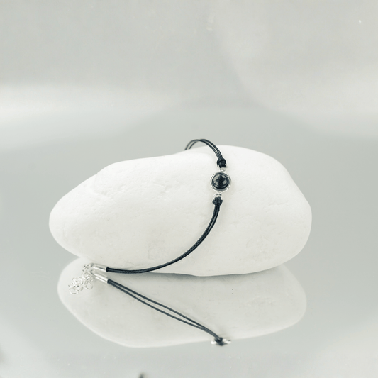 Bransoletka z zielonym oczkiem