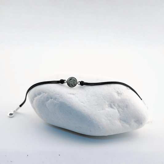 Bransoletka z zielonym oczkiem